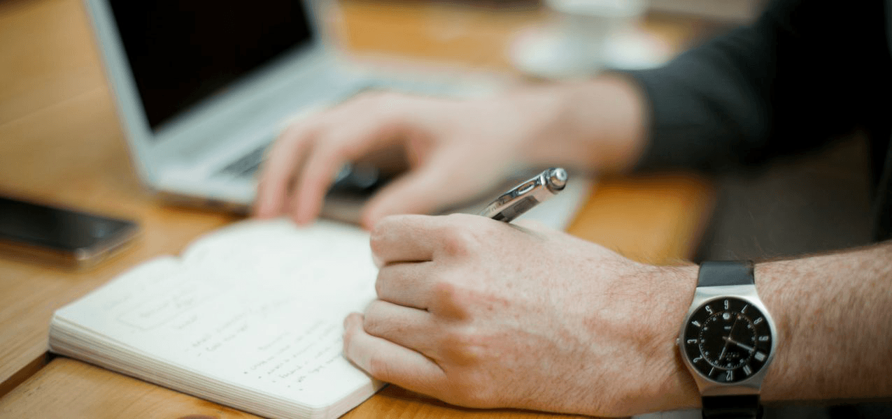 Man typing on laptop